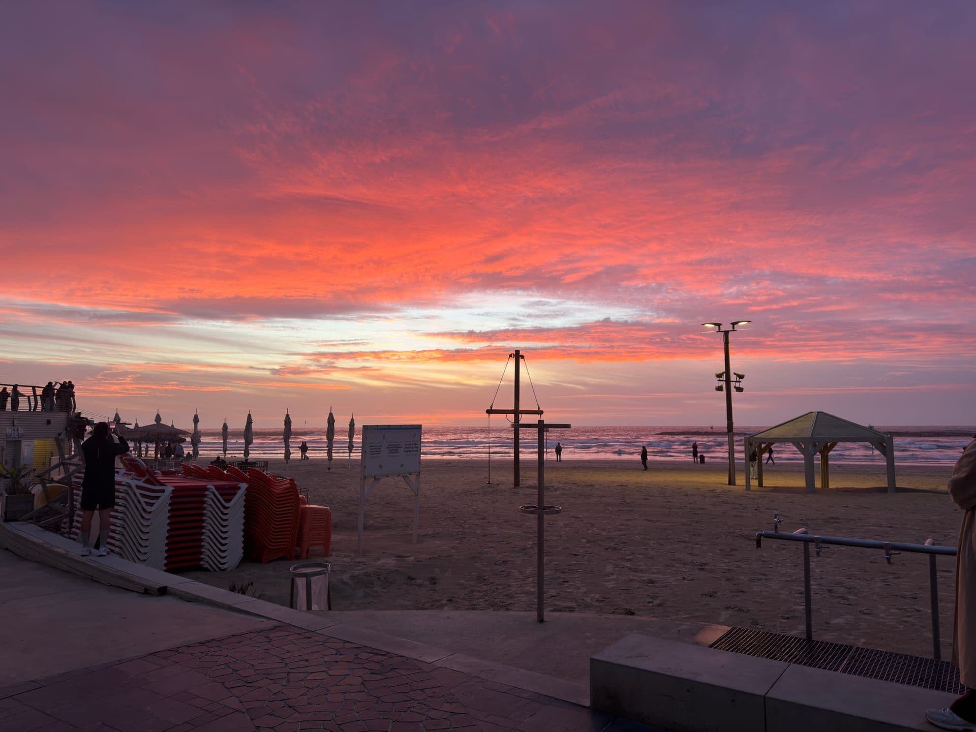 Stunning sunset over Tel Aviv beach — the best season to visit the city for warm weather and golden evenings